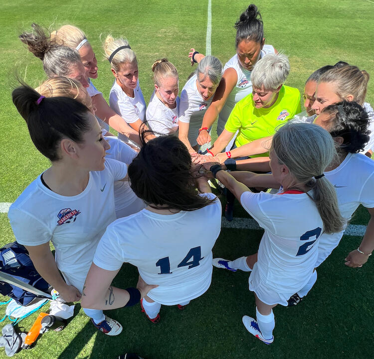 Soccer team huddle